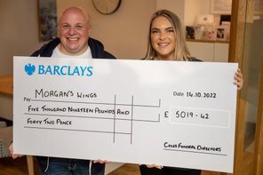 Coles presents the cheque to MW